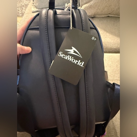 Loungefly SeaWorld Iridescent Purple Backpack - Picture 10 of 13